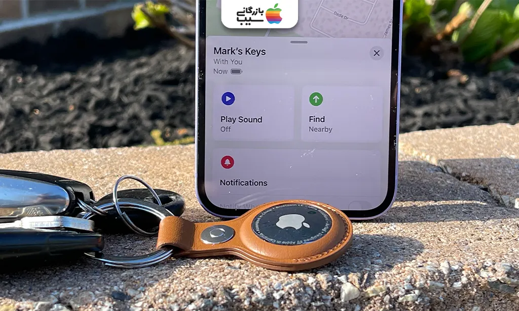 تصویر سوییچ ماشین با ایرتگ وصل شده به آن جهت نقد و بررسی ردیاب ایرتگ اپل Apple Airtag