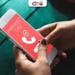 تصویری از یک گوشی در حالت اظطراری در دست یک خانم